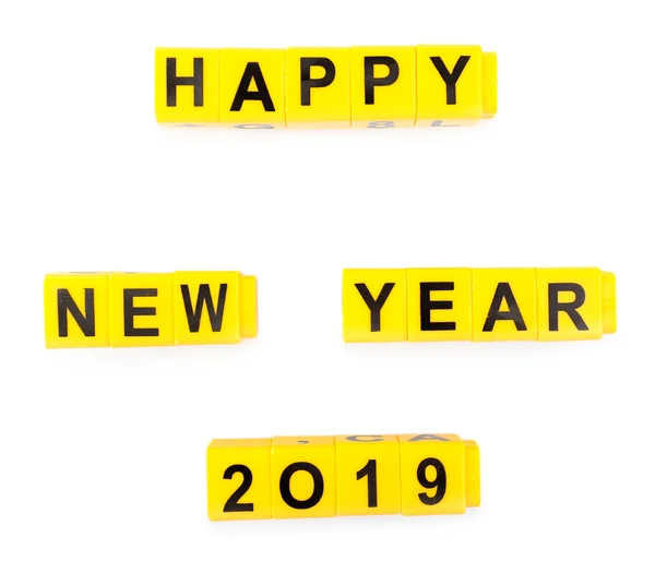 Feliz Ano Novo palavra formada por cubos educacionais, isolado em branco — Fotografia de Stock
