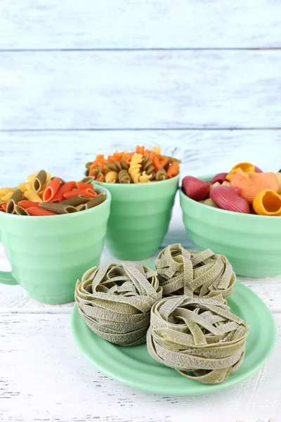 Pasta on wooden background — Stock Photo, Image