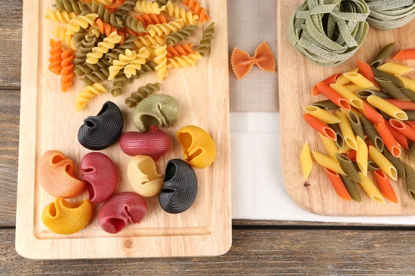 Pasta on wooden background — Stock Photo, Image