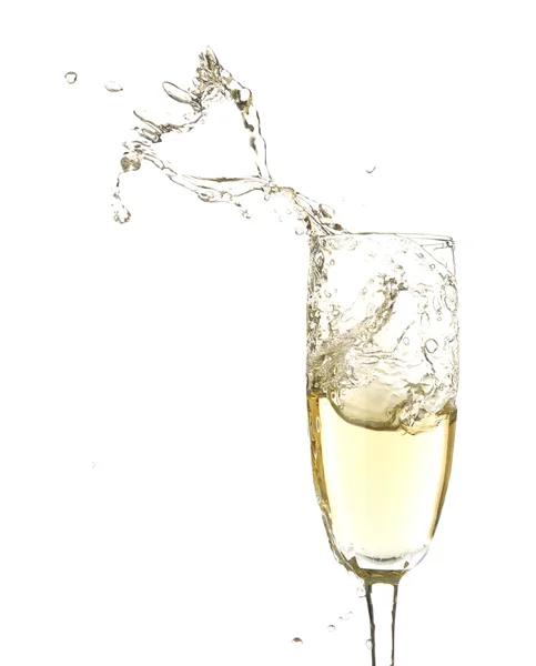 Glas Champagner mit Spritzer, isoliert auf weiß — Stockfoto