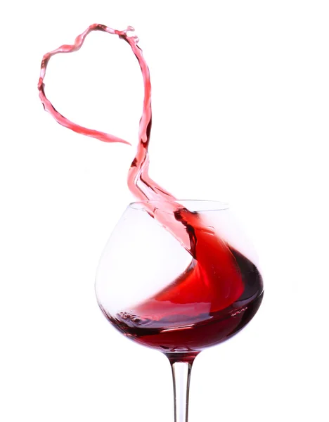 Wineglass with splashing red wine, isolated on white — Stock Photo, Image