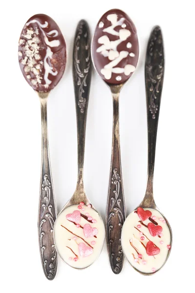 Spoons with tasty chocolate — Stock Photo, Image
