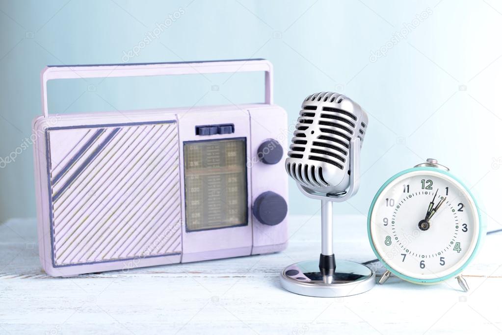 Vintage microphone,alarm clock and radio