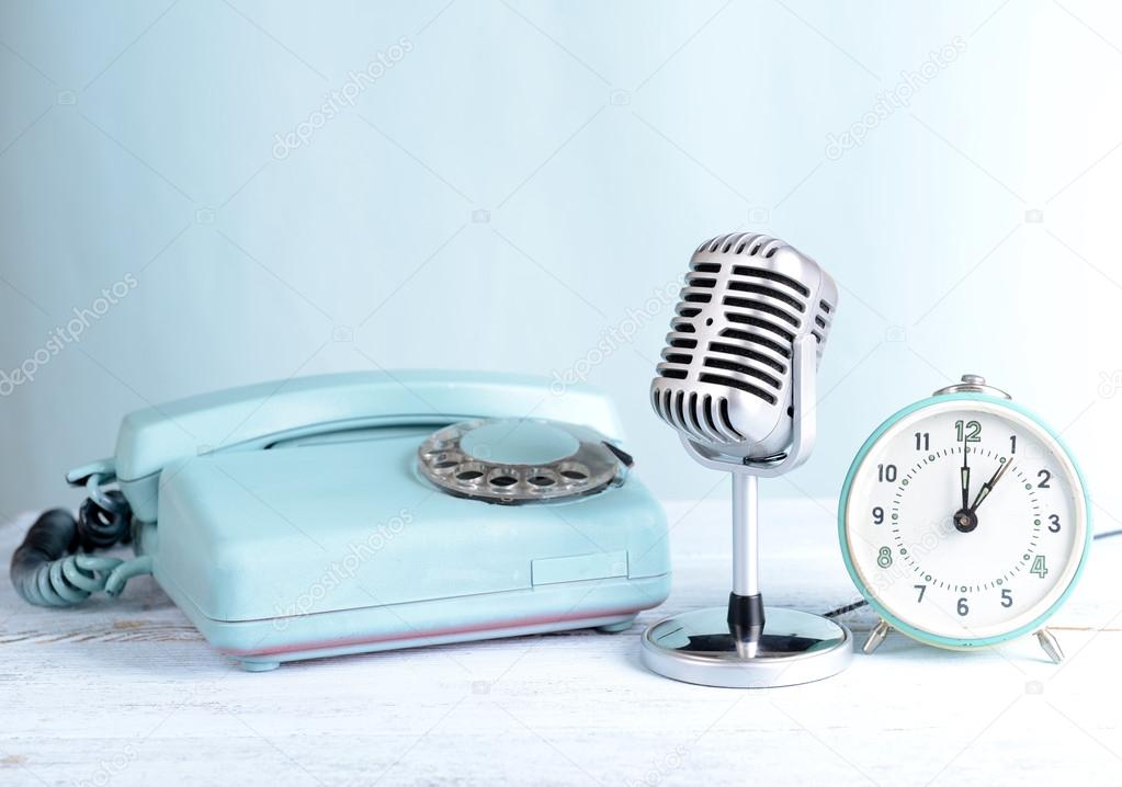 Vintage microphone,phone and alarm clock