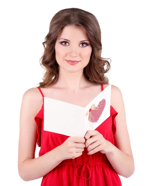 Hermosa joven en vestido rojo con tarjeta aislada en blanco — Foto de Stock