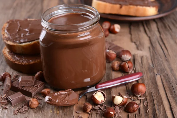 Sweet chocolate cream in jar — Stok Foto