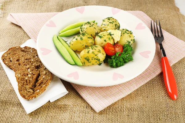 Young boiled potatoes on table, close up — Stock Photo, Image