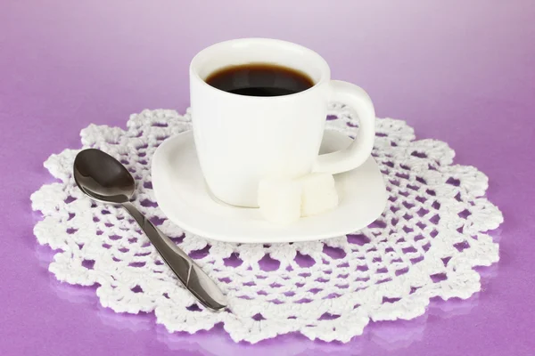 A cup of strong coffee on purple background — Stock Photo, Image