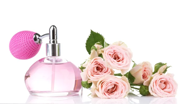 Bottiglia di profumo con rose — Foto Stock