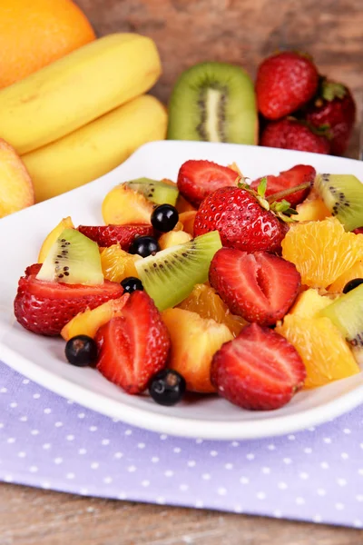 Fresh fruits salad on plate — Stock Photo, Image