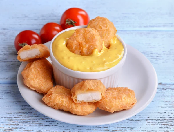 Chicken nuggets with sauce — Stock Photo, Image