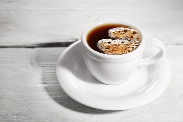 Cup of coffee on table — Stock Photo, Image