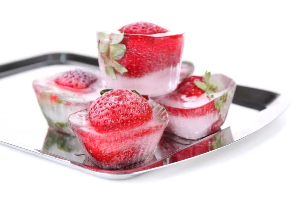 Ice cubes with strawberry on tray isolated on white — Stock Photo, Image