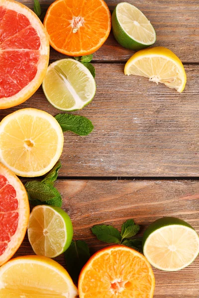 Different sliced juicy citrus fruits Stock Picture