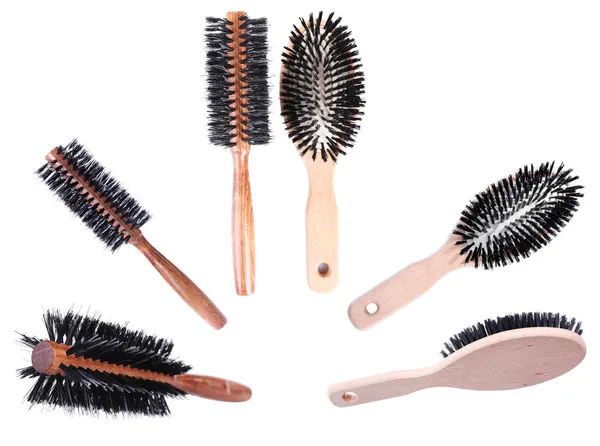 Wooden hairbrushes on white — Stock Photo, Image