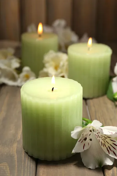 Beautiful candles with flowers — Stock Photo, Image