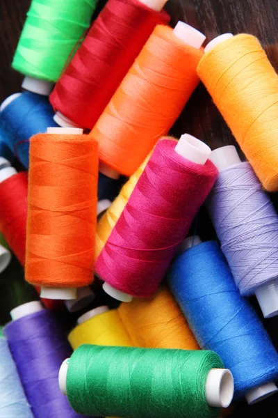 Multicolor sewing threads background — Stock Photo, Image