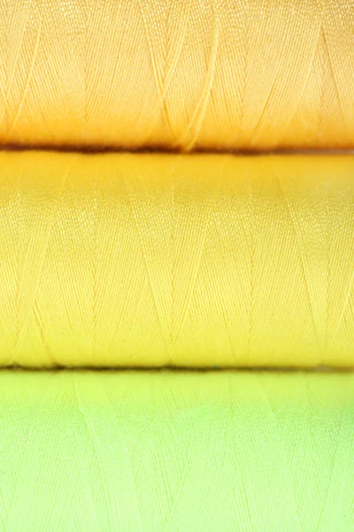 Multicolor sewing threads background — Stock Photo, Image