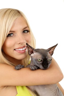 Güzel ve genç birbayan holding gri Sfenks kedi üzerinde beyaz izole