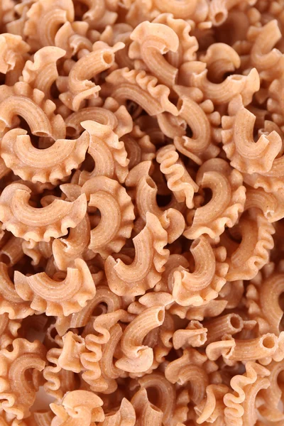 Bruine ruwe pasta — Stockfoto