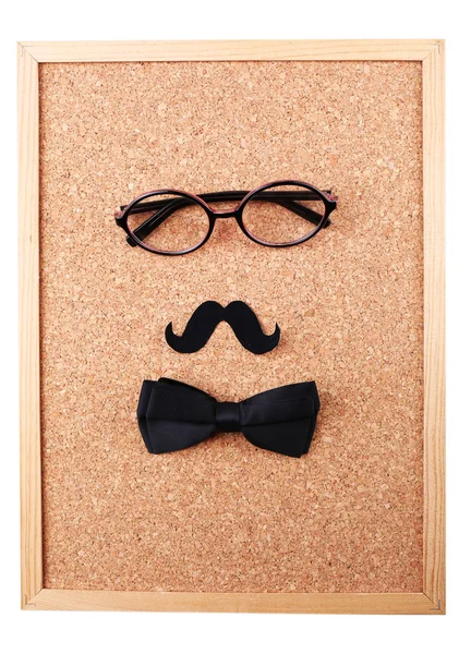 Glasses, mustache and bow tie forming man face — Stock Photo, Image