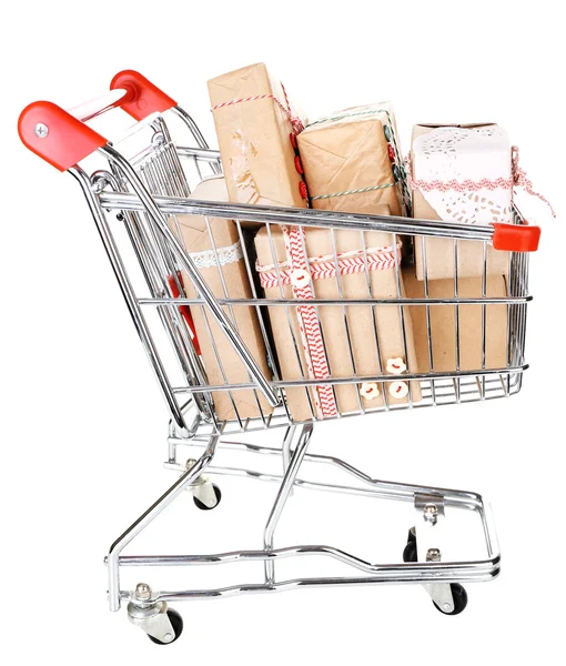 Many present boxes in shopping cart — Stock Photo, Image