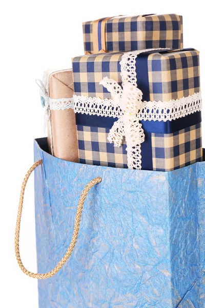 Present boxes in paper bag — Stock Photo, Image