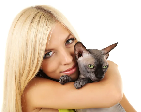 Beautiful young woman holding gray sphinx cat isolated on white — Stock Photo, Image