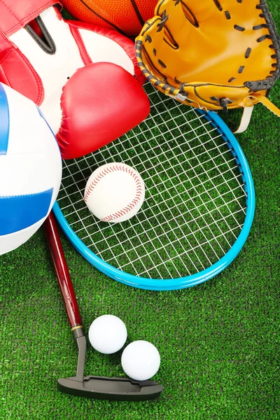 Sports equipment on grass — Stock Photo, Image