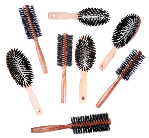 Wooden hairbrushes on white — Stock Photo, Image