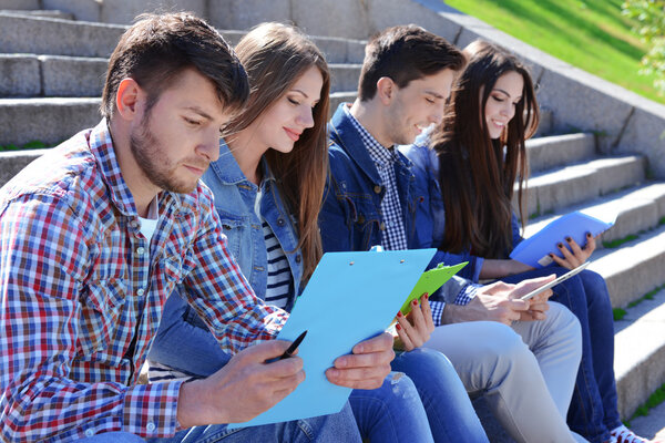 Students sitting on stairs