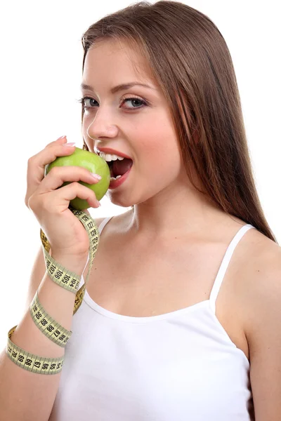 Mädchen mit Apfel und Maßband — Stockfoto