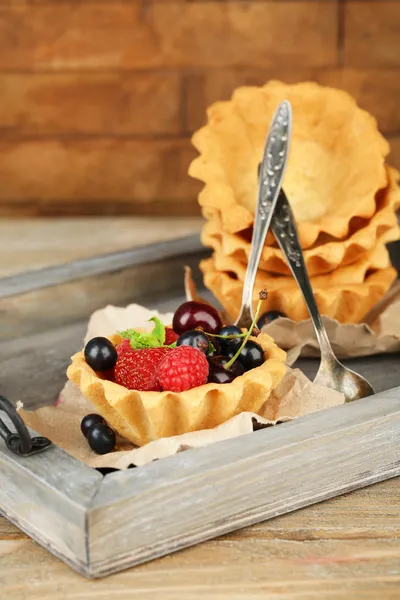 Tasty tartlets with berries — Stock Photo, Image