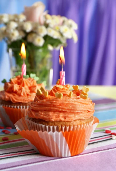 Tasty cupcakes on table — Stock Photo, Image