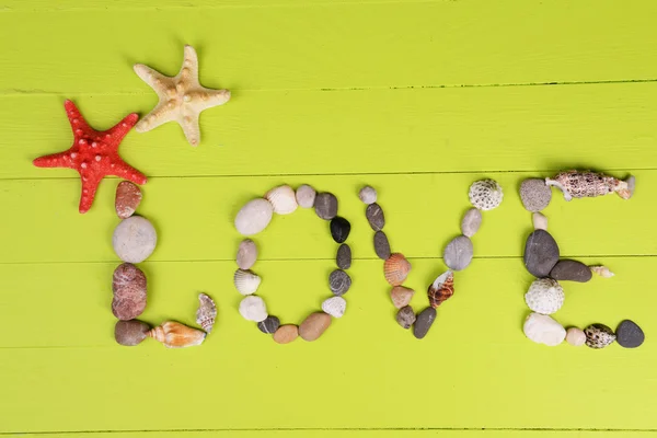 Word love made from sea shells — Stock Photo, Image