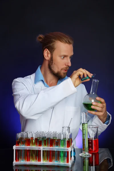 Crazy scientist in laboratory — Stock Photo, Image