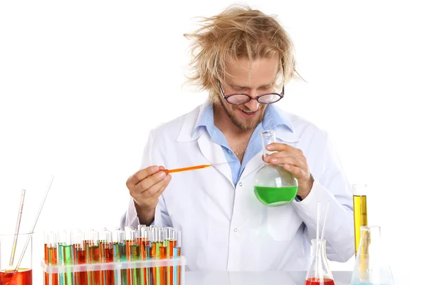 Crazy scientist working with tubes — Stock Photo, Image