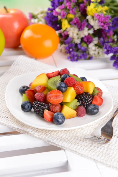 Delicious fruits salad in plate — Stock Photo, Image