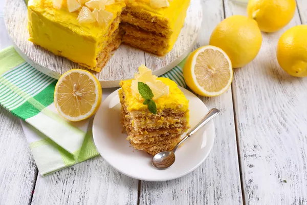 Tasty lemon dessert on wooden table — Stock Photo, Image