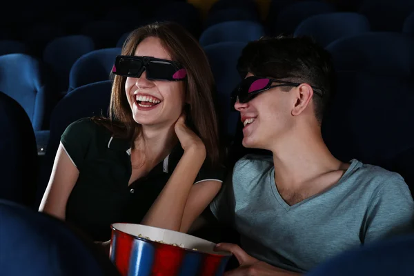 Couple watching movie in cinema Stock Image