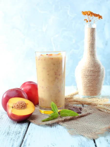 Delicious smoothie on table — Stock Photo, Image