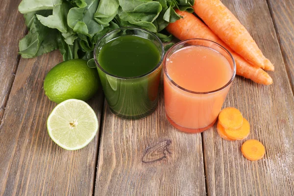 Glasses of carrot and sorrel — Stock Photo, Image