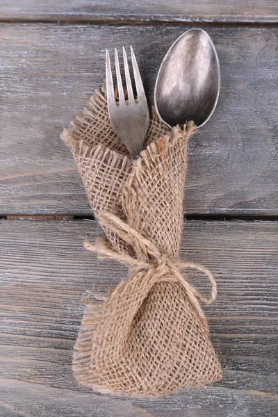 Old vintage silverware on wooden table — Stock Photo, Image