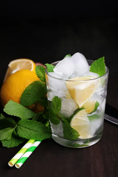 Fresh ingredients for mojito on old wooden table — Stock Photo, Image