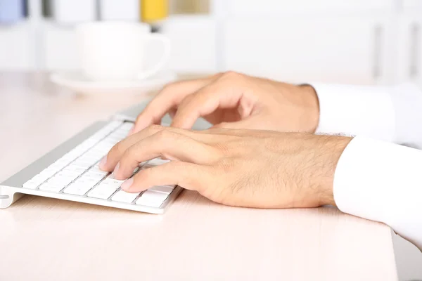 Man working with keyboard — Stock Photo, Image