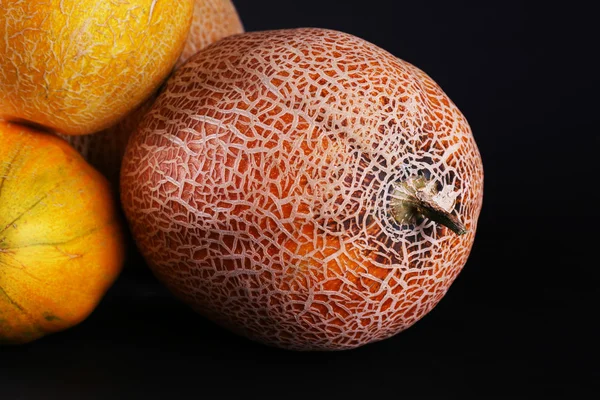 Melons isolated on black — Stock Photo, Image