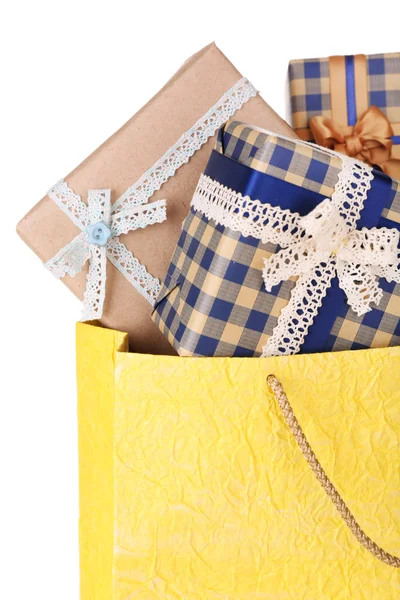 Present boxes in paper bag — Stock Photo, Image