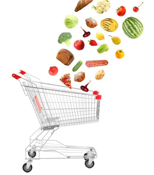 Products falling in shopping cart, isolated on white — Stock Photo, Image