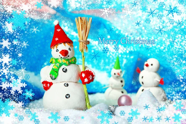 Beautiful snowmen and Christmas decor, on bright background — Stock Photo, Image