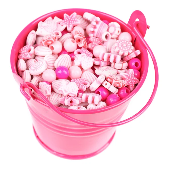 Beads for children in coloured metal bucket isolated on white — Stock Photo, Image